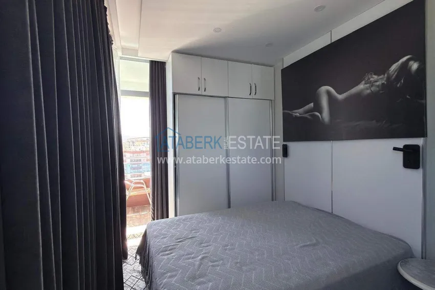 Kupuj Apartament 1+1 w centrum Mahmutlar - na 12. piętrze z meblami i widokiem na góry 5