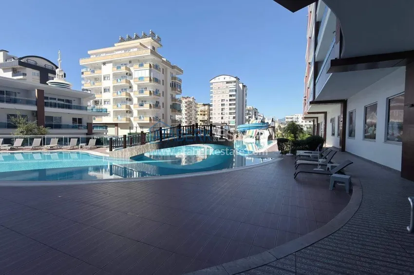 Apartament 1+1 w centrum Mahmutlar - na 12. piętrze z meblami i widokiem na góry 6