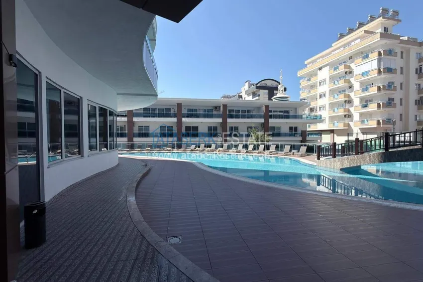 Apartament 1+1 w centrum Mahmutlar - na 12. piętrze z meblami i widokiem na góry 7