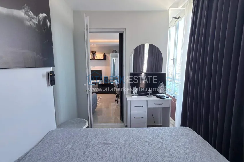 Kupuj Apartament 1+1 w centrum Mahmutlar - na 12. piętrze z meblami i widokiem na góry 6