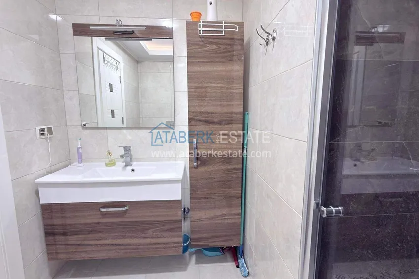 Kupuj Apartament 1+1 w centrum Mahmutlar - na 12. piętrze z meblami i widokiem na góry 9