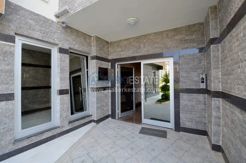 Apartament 1+1 70 m2 w Kestel — umeblowany, przeszklony balkon, 100 metrów od morza 13 