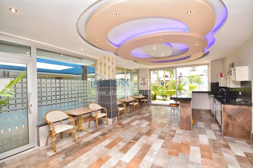 Apartament 1+1 70 m2 w Kestel — umeblowany, przeszklony balkon, 100 metrów od morza 15 