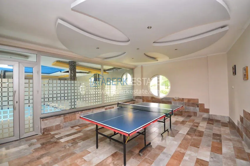 Apartament 1+1 70 m2 w Kestel — umeblowany, przeszklony balkon, 100 metrów od morza 22 