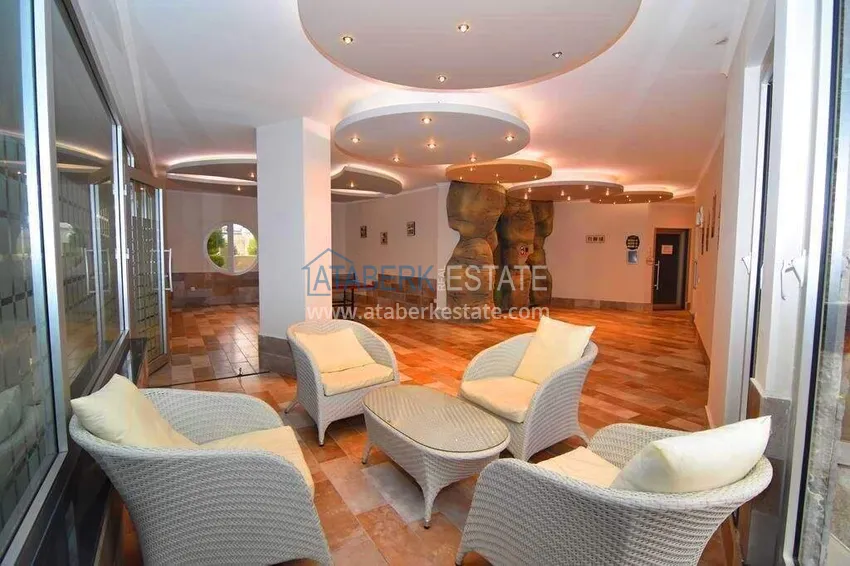 Apartament 1+1 70 m2 w Kestel — umeblowany, przeszklony balkon, 100 metrów od morza 23 