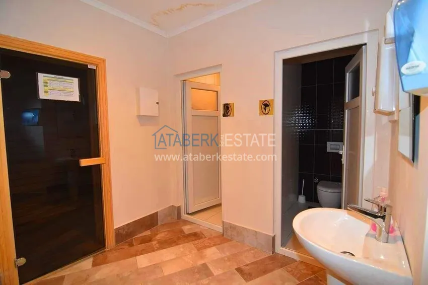 Apartament 1+1 70 m2 w Kestel — umeblowany, przeszklony balkon, 100 metrów od morza 26 