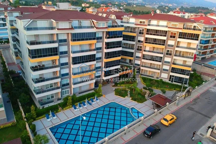 Apartament 1+1 70 m2 w Kestel — umeblowany, przeszklony balkon, 100 metrów od morza 3 