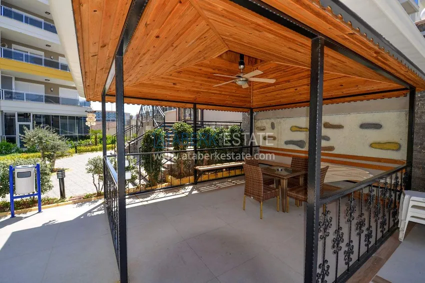 Apartament 1+1 70 m2 w Kestel — umeblowany, przeszklony balkon, 100 metrów od morza 9 