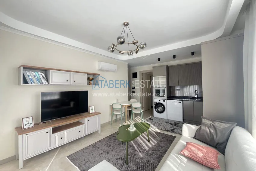 Kupuj  Apartament 1+1 z meblami w Cikcilli - nieruchomości w Alanyi na zezwolenie na pobyt 1 