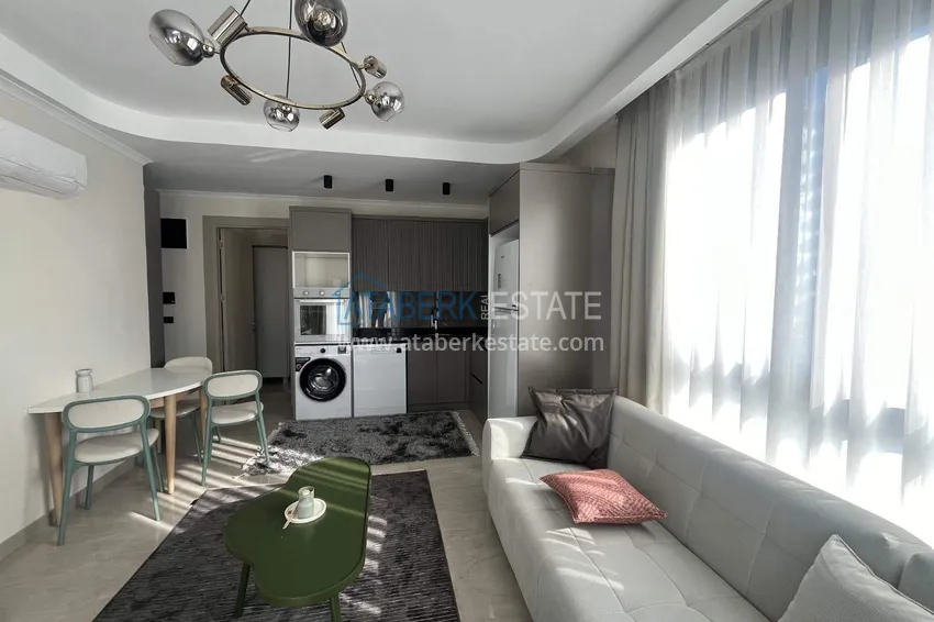 Kupuj  Apartament 1+1 z meblami w Cikcilli - nieruchomości w Alanyi na zezwolenie na pobyt 3 