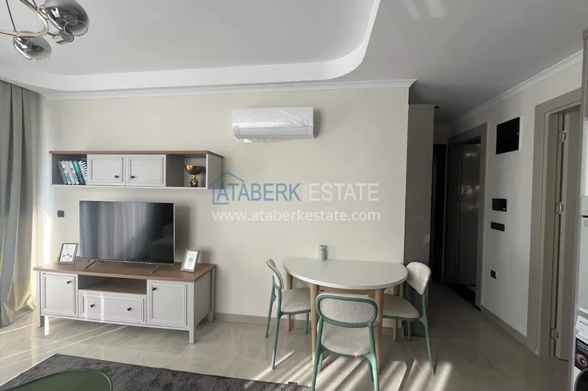Kupuj  Apartament 1+1 z meblami w Cikcilli - nieruchomości w Alanyi na zezwolenie na pobyt 4 