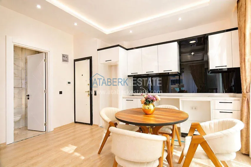 Kupuj  Apartament 1+1 w okazyjnej cenie w Mahmutlar - umeblowane i z widokiem na góry 4 