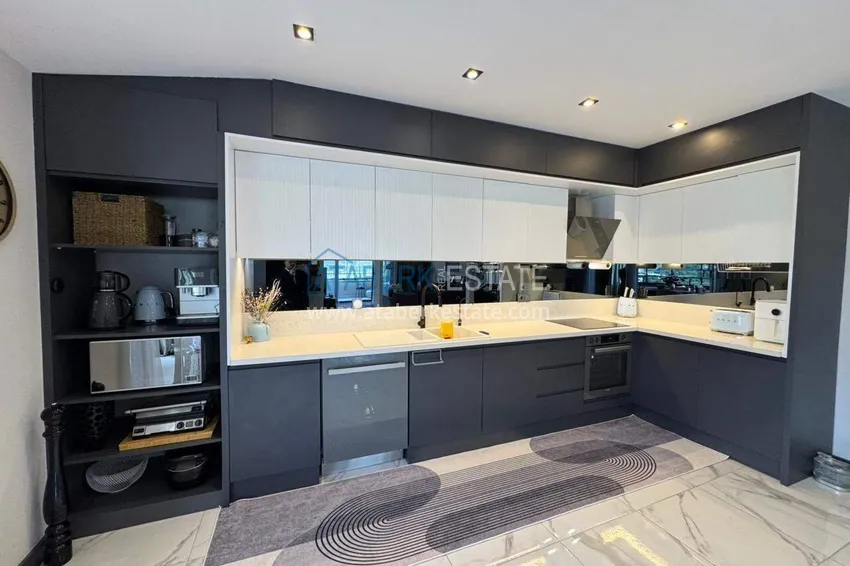 Kupuj  Panoramiczny dwupoziomowy penthouse z oryginalnym wnętrzem w centrum Mahmutlar, sobotni rynek 13 