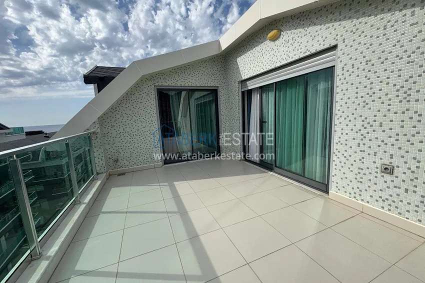 Kupuj  Dwupoziomowy penthouse 3+1 w Kargicak - pierwsza linia, prywatna plaża, raty 15-miesięczne 27 