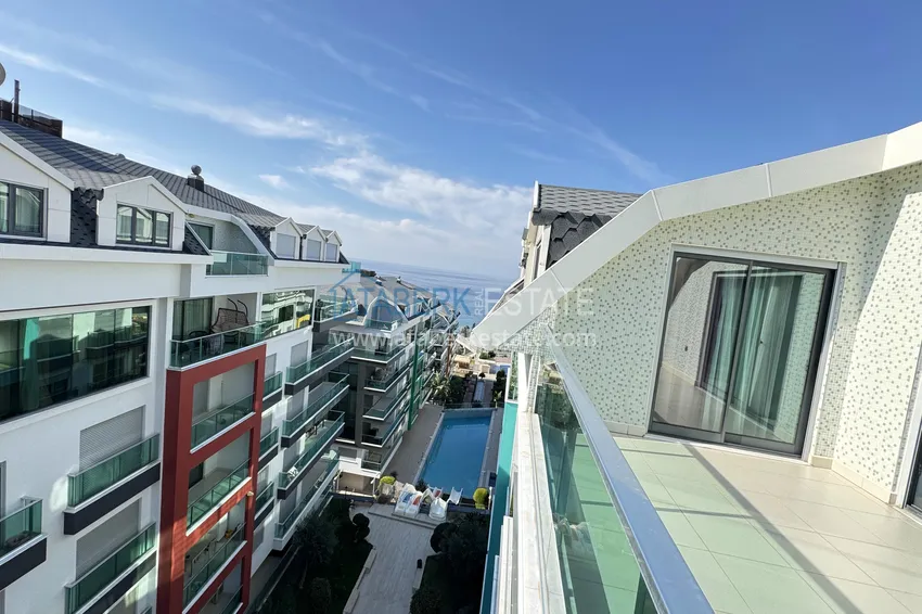 Kupuj  Dwupoziomowy penthouse 3+1 w Kargicak - pierwsza linia, prywatna plaża, raty 15-miesięczne 29 