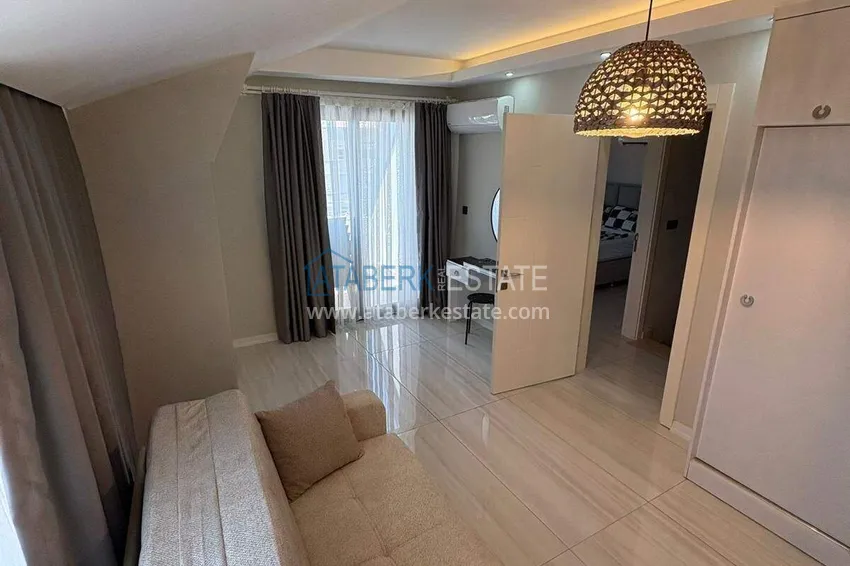 Kupuj  Dwupoziomowy penthouse 3+1 w centrum Alanyi, plaża Kleopatra - umeblowany, odpowiedni na zezwolenie na pobyt 10 