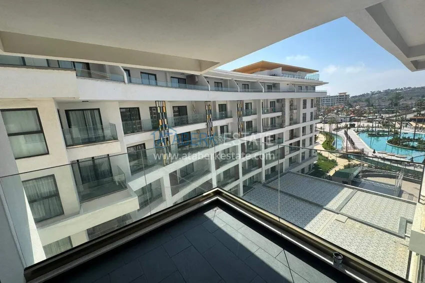 Kupuj  Apartament 4+1 w Turkler z rozszerzonym układem i meblami - ośrodek premium, obywatelstwo, zezwolenie na pobyt  31 