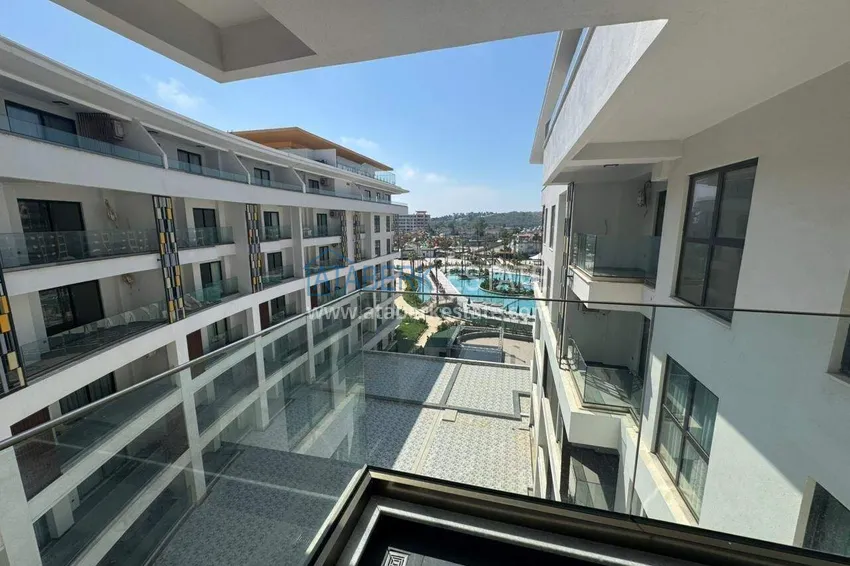 Kupuj  Apartament 4+1 w Turkler z rozszerzonym układem i meblami - ośrodek premium, obywatelstwo, zezwolenie na pobyt  32 