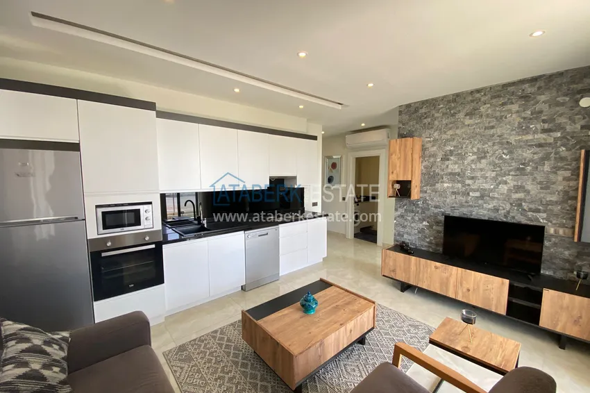 Kupuj  Apartament 2+1 przy plaży w Mahmutlar — meble, bezpośredni widok na morze  1 