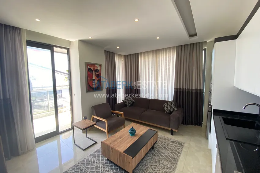 Kupuj  Apartament 2+1 przy plaży w Mahmutlar — meble, bezpośredni widok na morze  2 