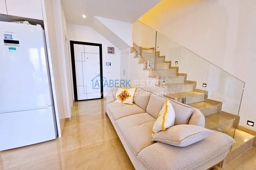 Kupuj  Dwupoziomowy penthouse 2+1 w Mahmutlar — meble, widok na morze i góry, kompleks z obsługą hotelową 1 