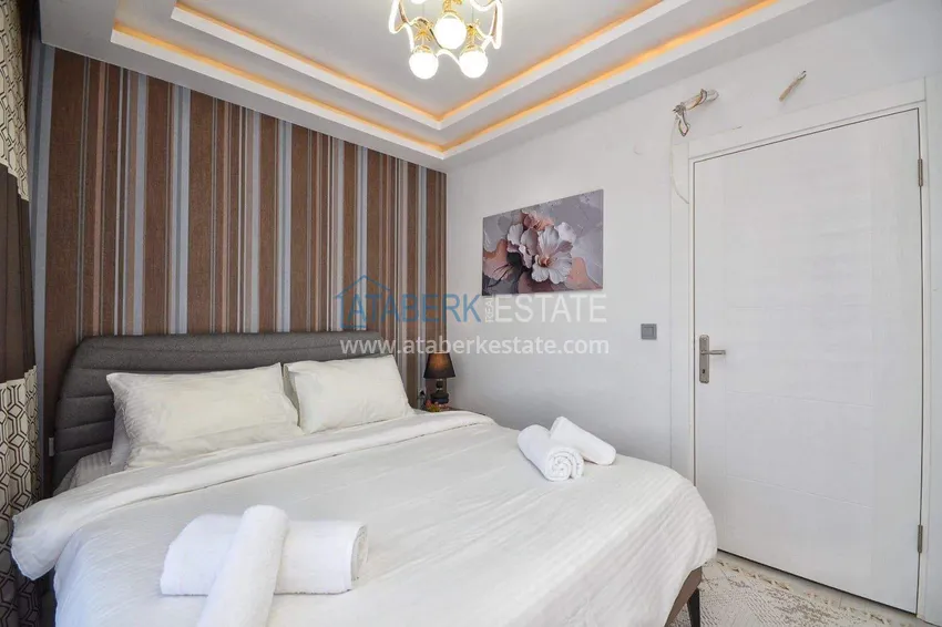 Kupuj  Penthouse duplex 2+1 w Mahmutlar - umeblowany i z widokiem na góry, w pobliżu centrum 21 