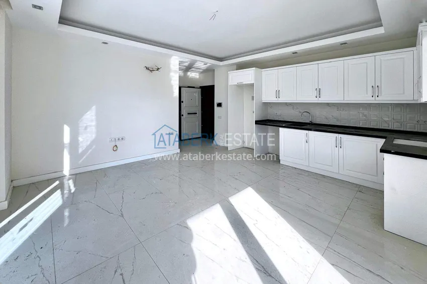 Kupuj  Gorąca oferta: 1+1 apartament w Mahmutlar - strona południowa, centrum dzielnicy 4 