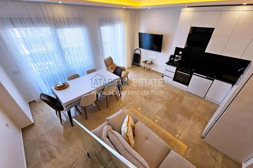 Kupuj  Dwupoziomowy penthouse 2+1 w Mahmutlar — meble, widok na morze i góry, kompleks z obsługą hotelową 4 
