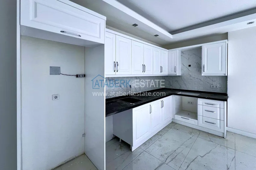 Kupuj  Gorąca oferta: 1+1 apartament w Mahmutlar - strona południowa, centrum dzielnicy 5 