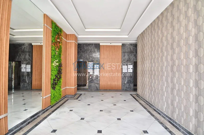 Apartament 1+1 57 m² z widokiem na morze w Mahmutlar - nowoczesny kompleks mieszkalny 13 