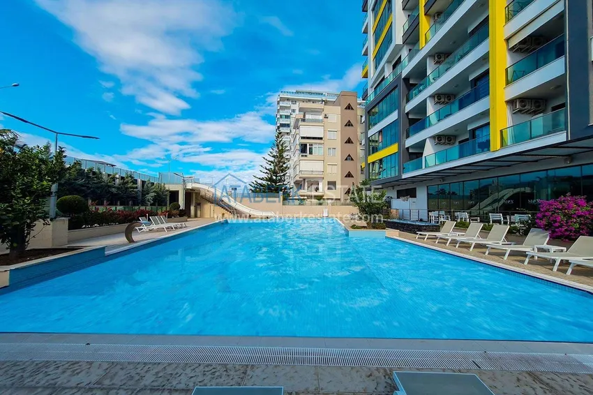 Apartament 2+1 w Mahmutlar — meble, widok na góry, pierwsza linia brzegowa  5 