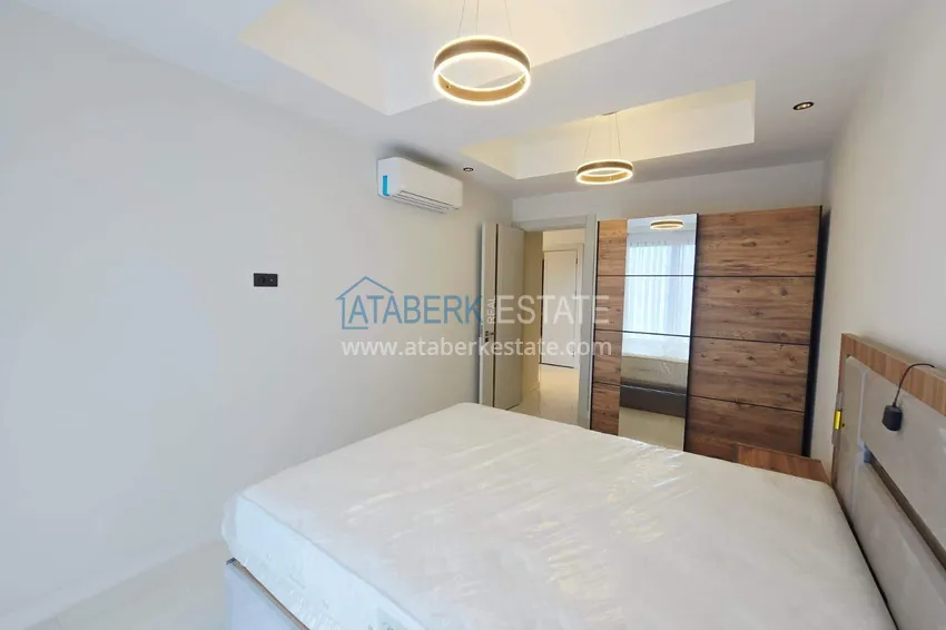 Kupuj  Przestronny apartament 1+1 w Turkler — 80 m2 umeblowany przez właściciela, ośrodek premium 13 