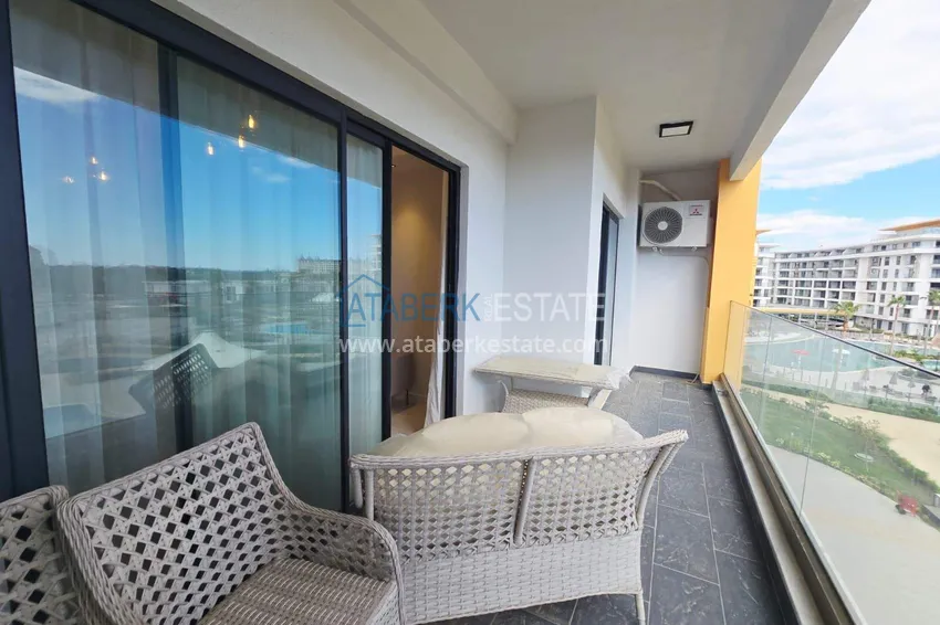 Kupuj  Przestronny apartament 1+1 w Turkler — 80 m2 umeblowany przez właściciela, ośrodek premium 16 