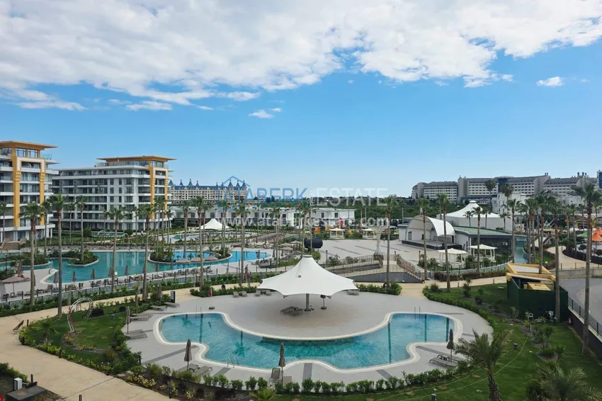 Kupuj  Przestronny apartament 1+1 w Turkler — 80 m2 umeblowany przez właściciela, ośrodek premium 19 