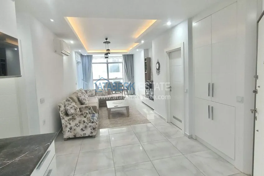 Kupuj  2+1 mieszkanie 140 m2 w Mahmutlar — meble, przeszklony balkon, kompleks premium 3 