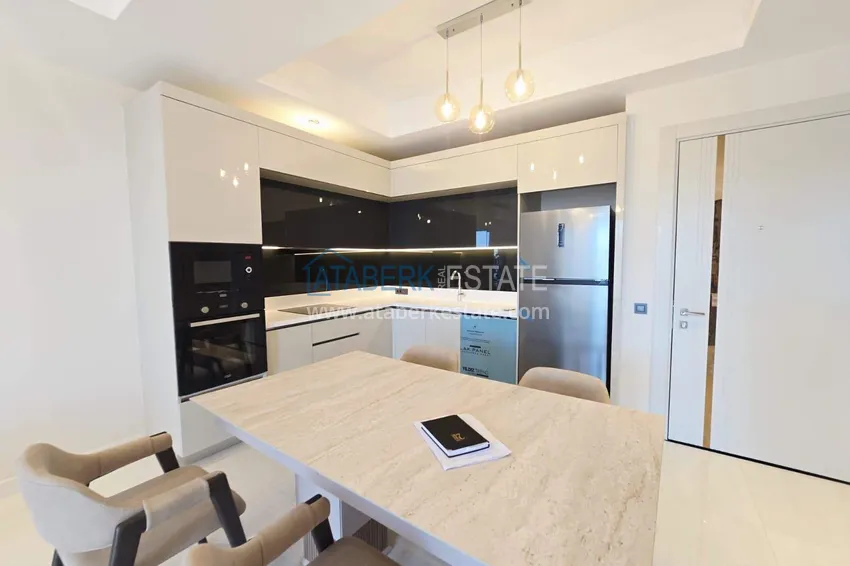 Kupuj  Przestronny apartament 1+1 w Turkler — 80 m2 umeblowany przez właściciela, ośrodek premium 5 