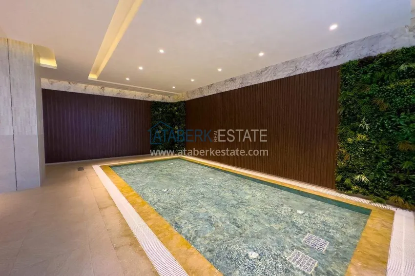 Przestronny apartament 1+1 w Turkler — 80 m2 umeblowany przez właściciela, ośrodek premium 66 