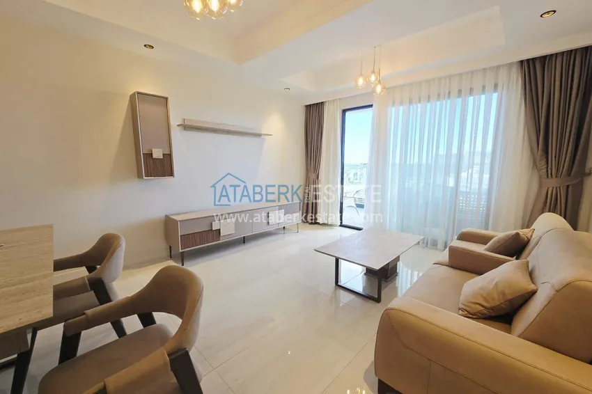 Kupuj  Przestronny apartament 1+1 w Turkler — 80 m2 umeblowany przez właściciela, ośrodek premium 7 