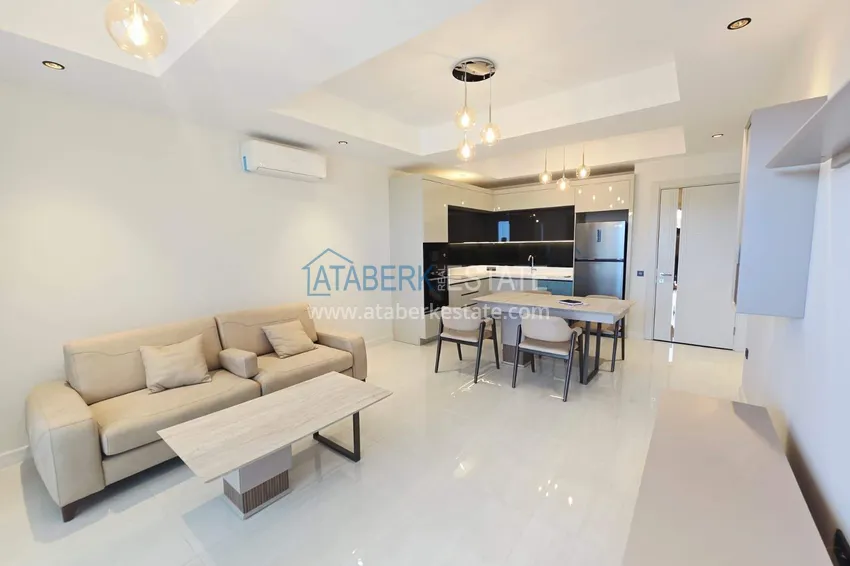 Kupuj  Przestronny apartament 1+1 w Turkler — 80 m2 umeblowany przez właściciela, ośrodek premium 9 