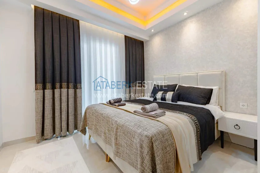 Kupuj  1+1 panoramiczny apartament w centrum Mahmutlar - luksusowe meble, morze w odległości spaceru 10 