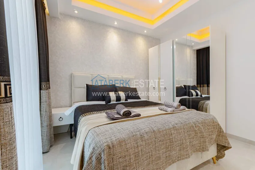 Kupuj  1+1 panoramiczny apartament w centrum Mahmutlar - luksusowe meble, morze w odległości spaceru 11 