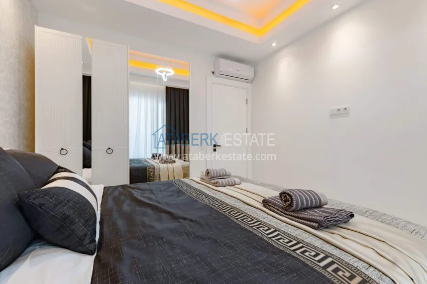 Kupuj  1+1 panoramiczny apartament w centrum Mahmutlar - luksusowe meble, morze w odległości spaceru 12 