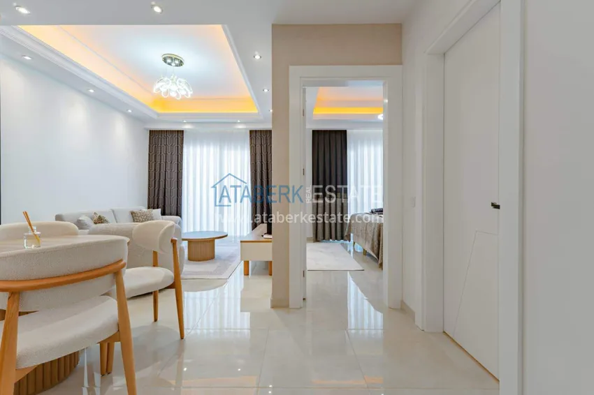 Kupuj  1+1 panoramiczny apartament w centrum Mahmutlar - luksusowe meble, morze w odległości spaceru 1 