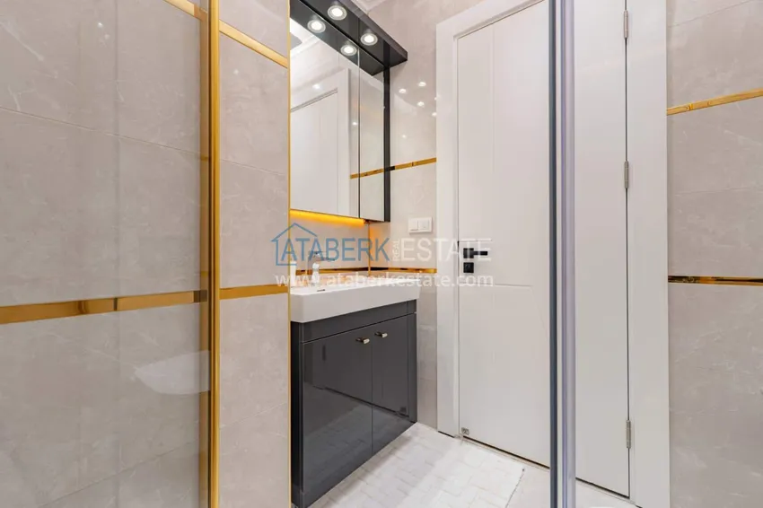 Kupuj  1+1 panoramiczny apartament w centrum Mahmutlar - luksusowe meble, morze w odległości spaceru 14 