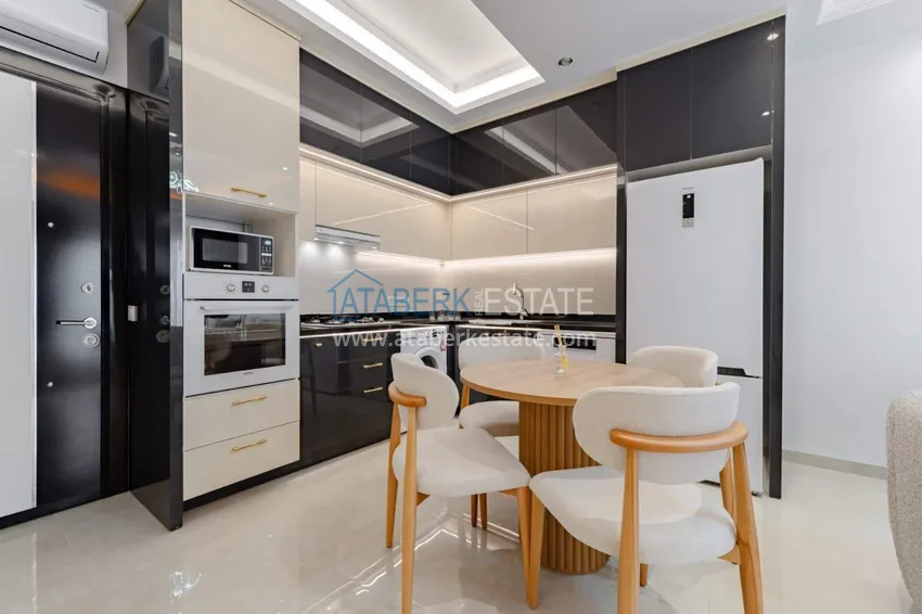 Kupuj  1+1 panoramiczny apartament w centrum Mahmutlar - luksusowe meble, morze w odległości spaceru 2 