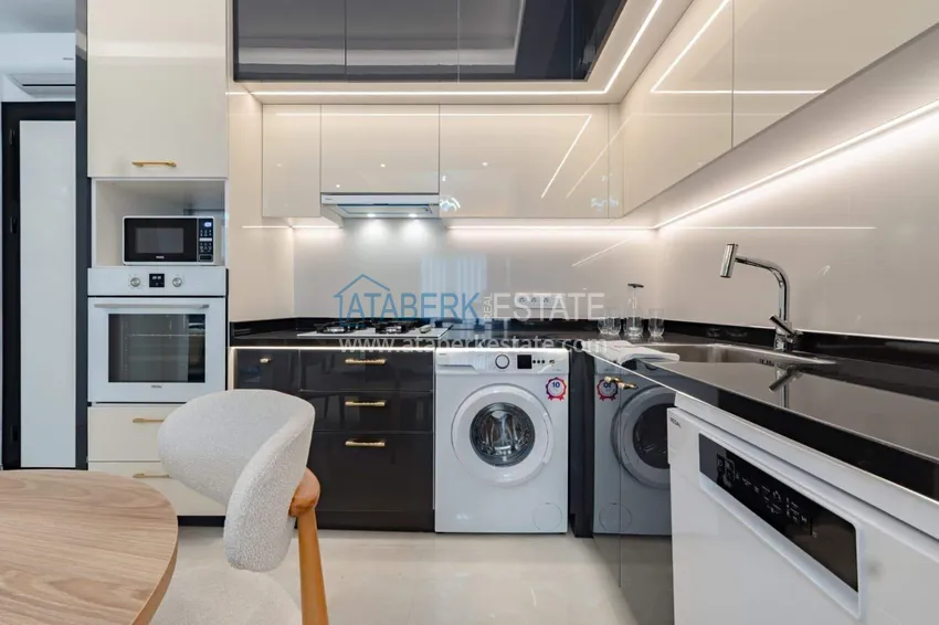 Kupuj  1+1 panoramiczny apartament w centrum Mahmutlar - luksusowe meble, morze w odległości spaceru 4 
