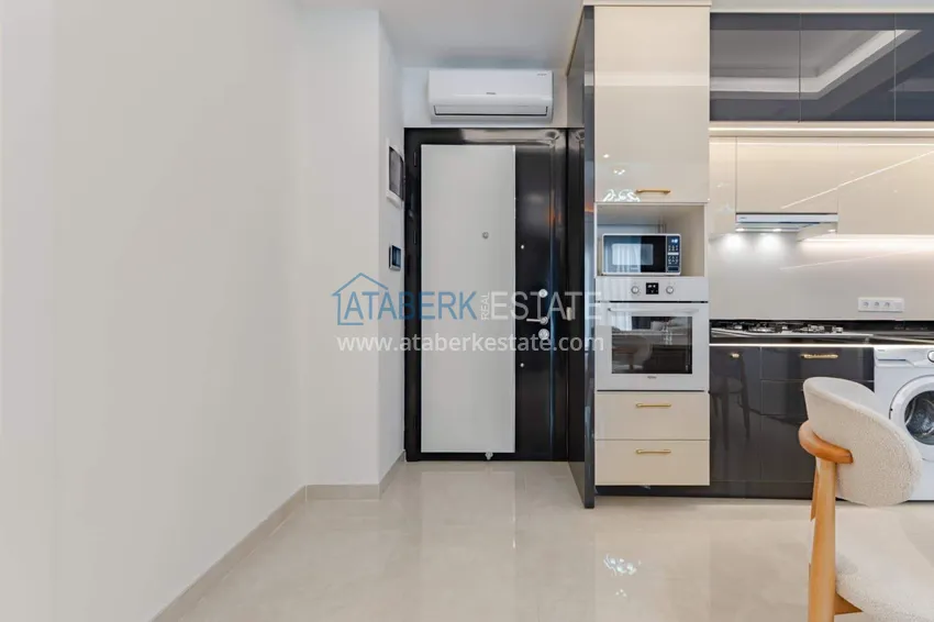 Kupuj  1+1 panoramiczny apartament w centrum Mahmutlar - luksusowe meble, morze w odległości spaceru 5 