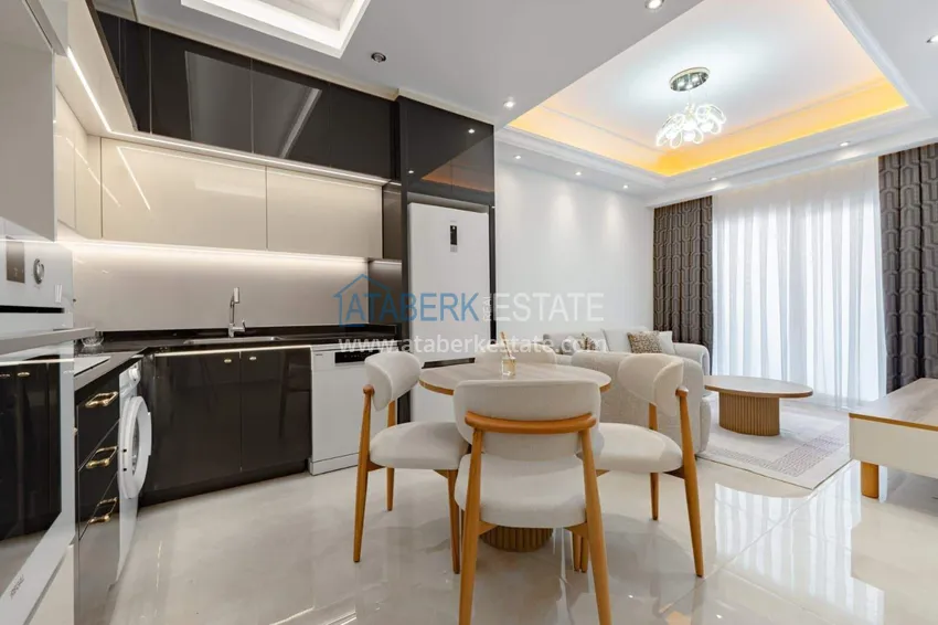 Kupuj  1+1 panoramiczny apartament w centrum Mahmutlar - luksusowe meble, morze w odległości spaceru 6 