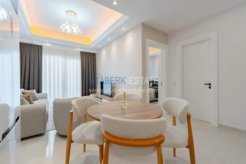 Kupuj  1+1 panoramiczny apartament w centrum Mahmutlar - luksusowe meble, morze w odległości spaceru 7 