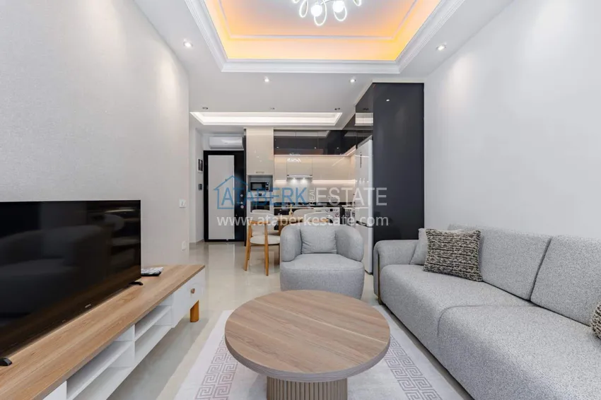 Kupuj  1+1 panoramiczny apartament w centrum Mahmutlar - luksusowe meble, morze w odległości spaceru 8 
